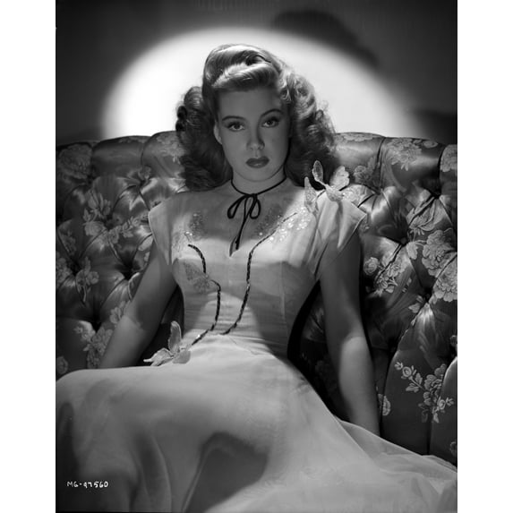 Gloria DeHaven sitting On A Couch in Gown in Black and White Photo Print (8 x 10)