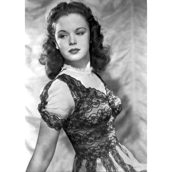 Gloria Jean on an Embroidered Top and Reclining Photo Print (8 x 10)