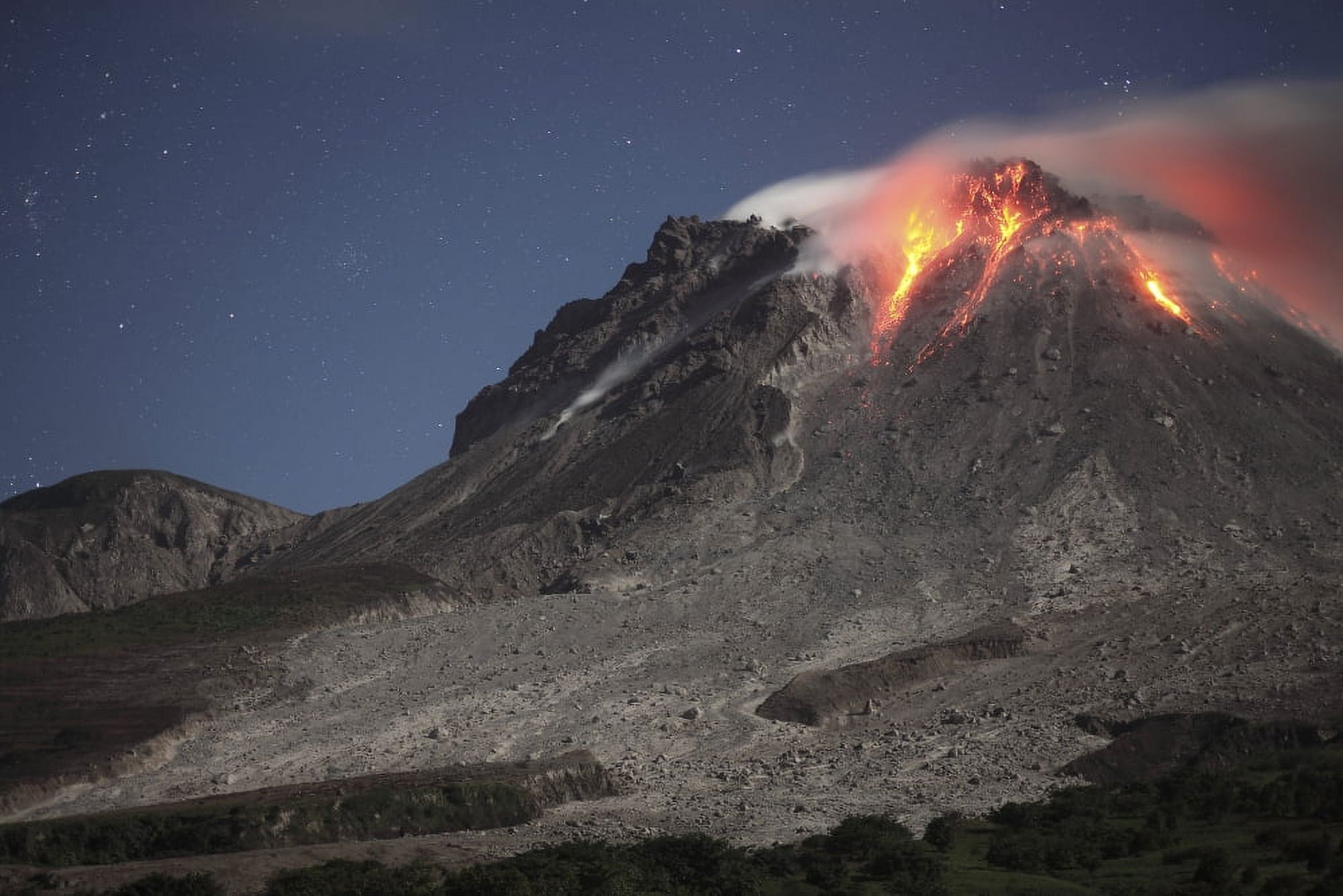 Glowing lava dome during eruption of Soufriere Hills volcano Montserrat Caribbean Canvas Art - Richard RoscoeStocktrek Images (35 x 23)