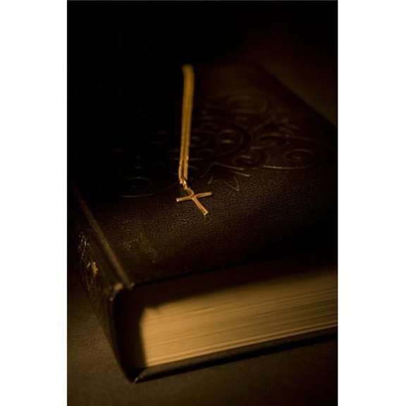 Gold Cross Pendant Resting On A Book Poster Print, 11 x 17
