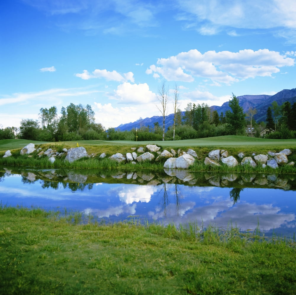 Golf course with mountain range in the background Teton Pines Golf Course Jackson Wyoming USA Canvas Art - Panoramic Images (24 x 24)