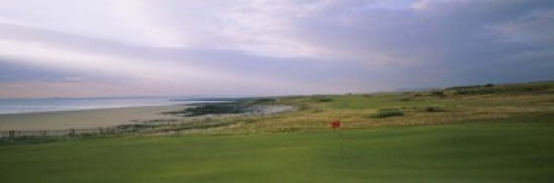 Golf flag on a golf course Royal Porthcawl Golf Club Porthcawl Wales Canvas Art - Panoramic Images (18 x 6)