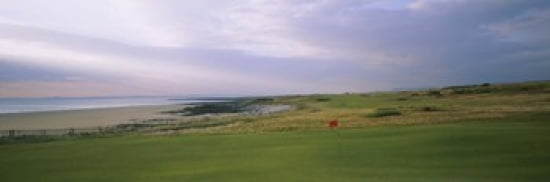 Golf flag on a golf course Royal Porthcawl Golf Club Porthcawl Wales Canvas Art - Panoramic Images (36 x 12)