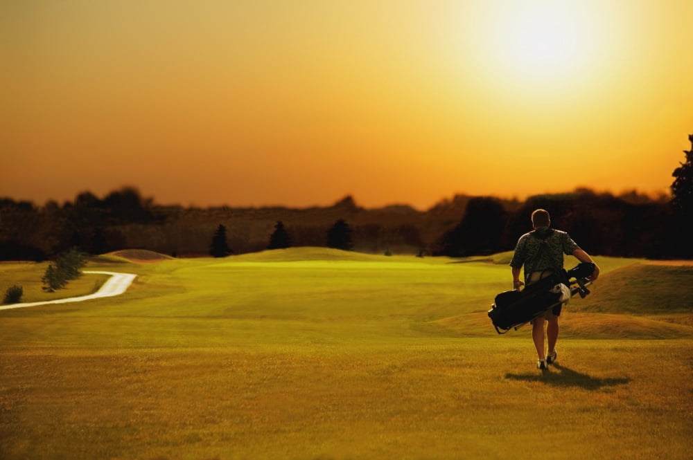 Golfer Walking On A Golf Course Canvas Art - Darren Greenwood Design Pics (34 x 22)