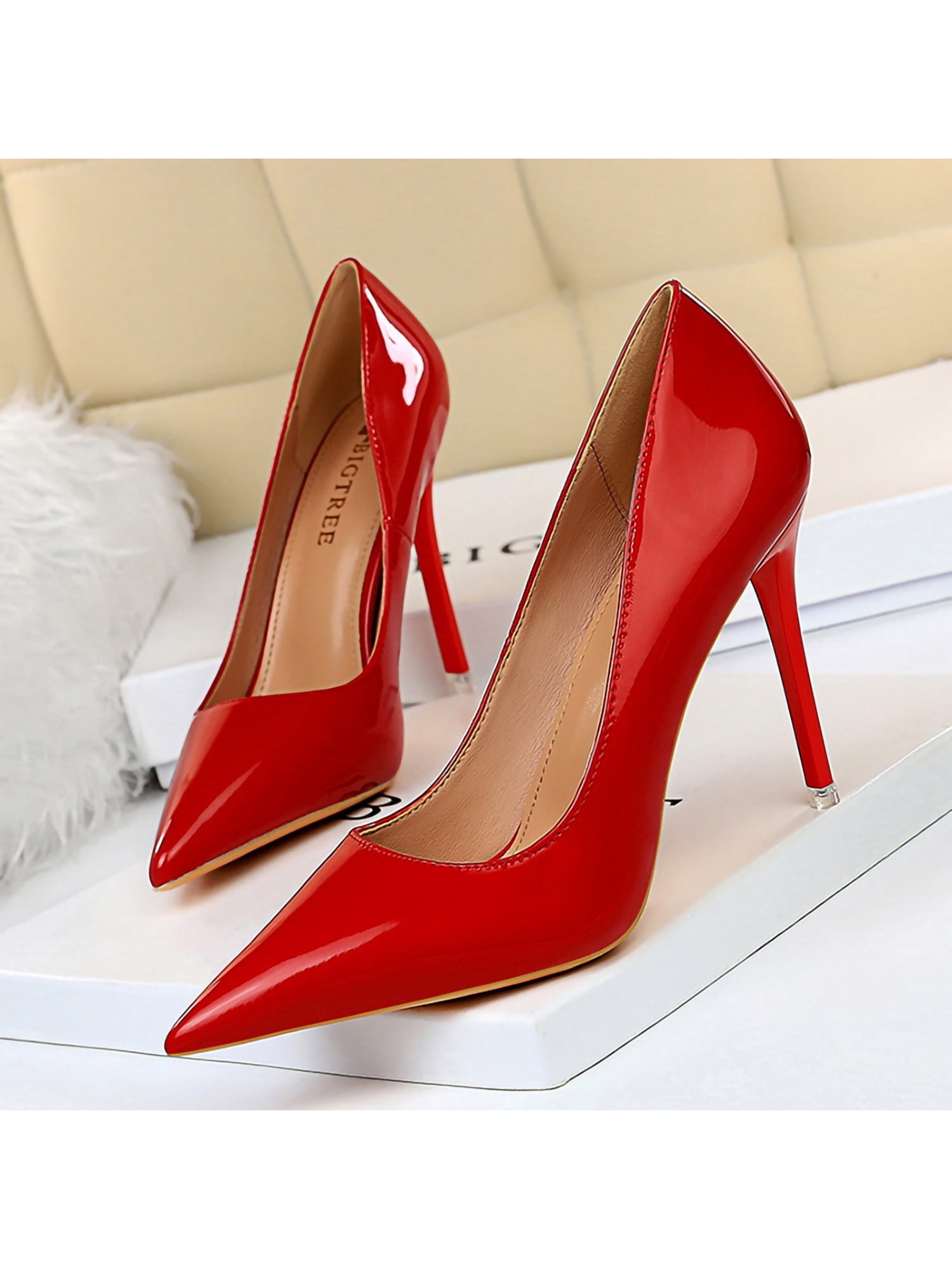 Elegant womans high heels in bloody red color 27543363 Stock Photo at  Vecteezy