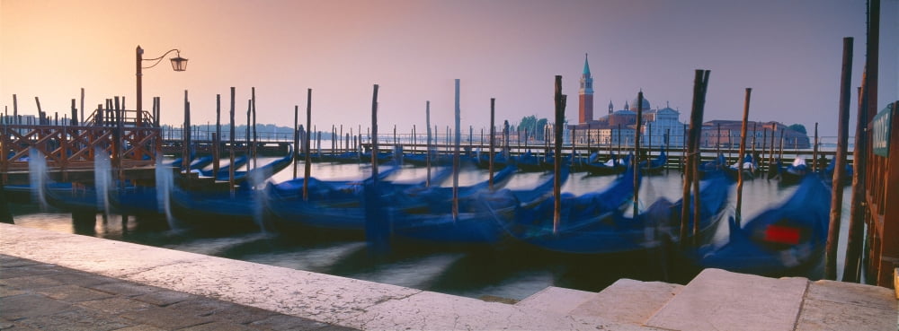 Gondolas at a dock Venice Veneto Italy Canvas Art - Panoramic Images (27 x 9)