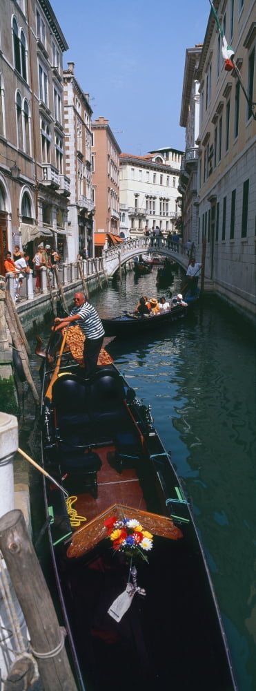 Gondolas in a canal Venice Veneto Italy Canvas Art - Panoramic Images (36 x 12)