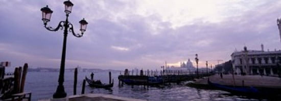 Gondolas in canal with a church in the background Sana Maria Della Salute Grand Canal Venice Italy Canvas Art - Panoramic Images (18 x 7)