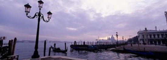 Gondolas in canal with a church in the background Sana Maria Della Salute Grand Canal Venice Italy Canvas Art - Panoramic Images (36 x 13)