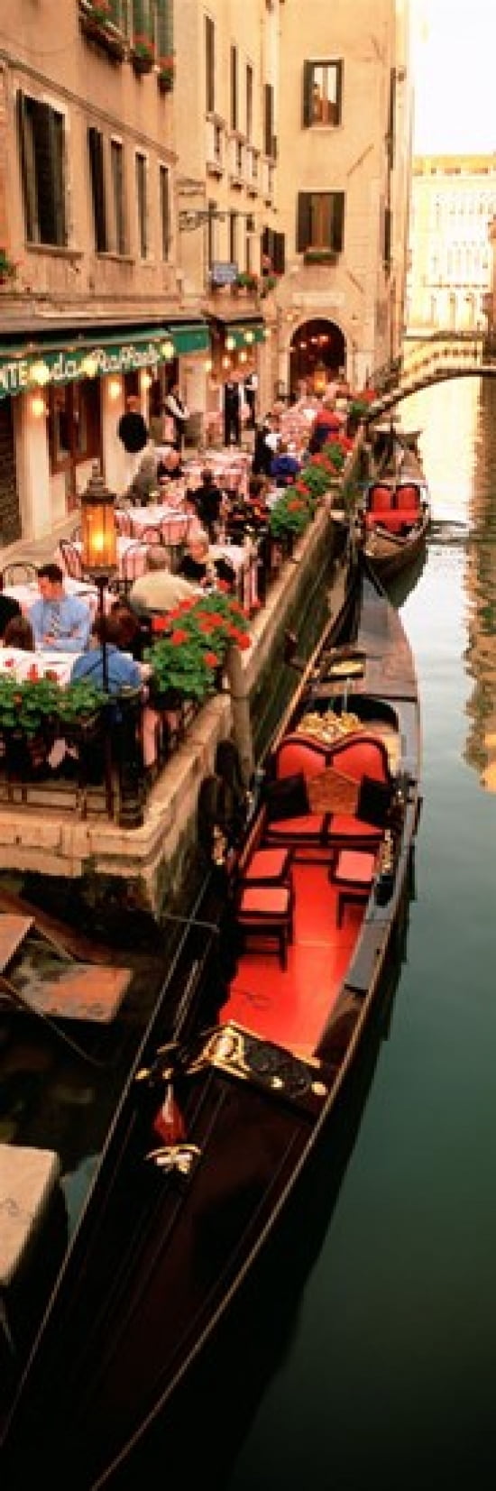 Gondolas moored outside of a cafe Venice Italy Canvas Art - Panoramic Images (36 x 13)