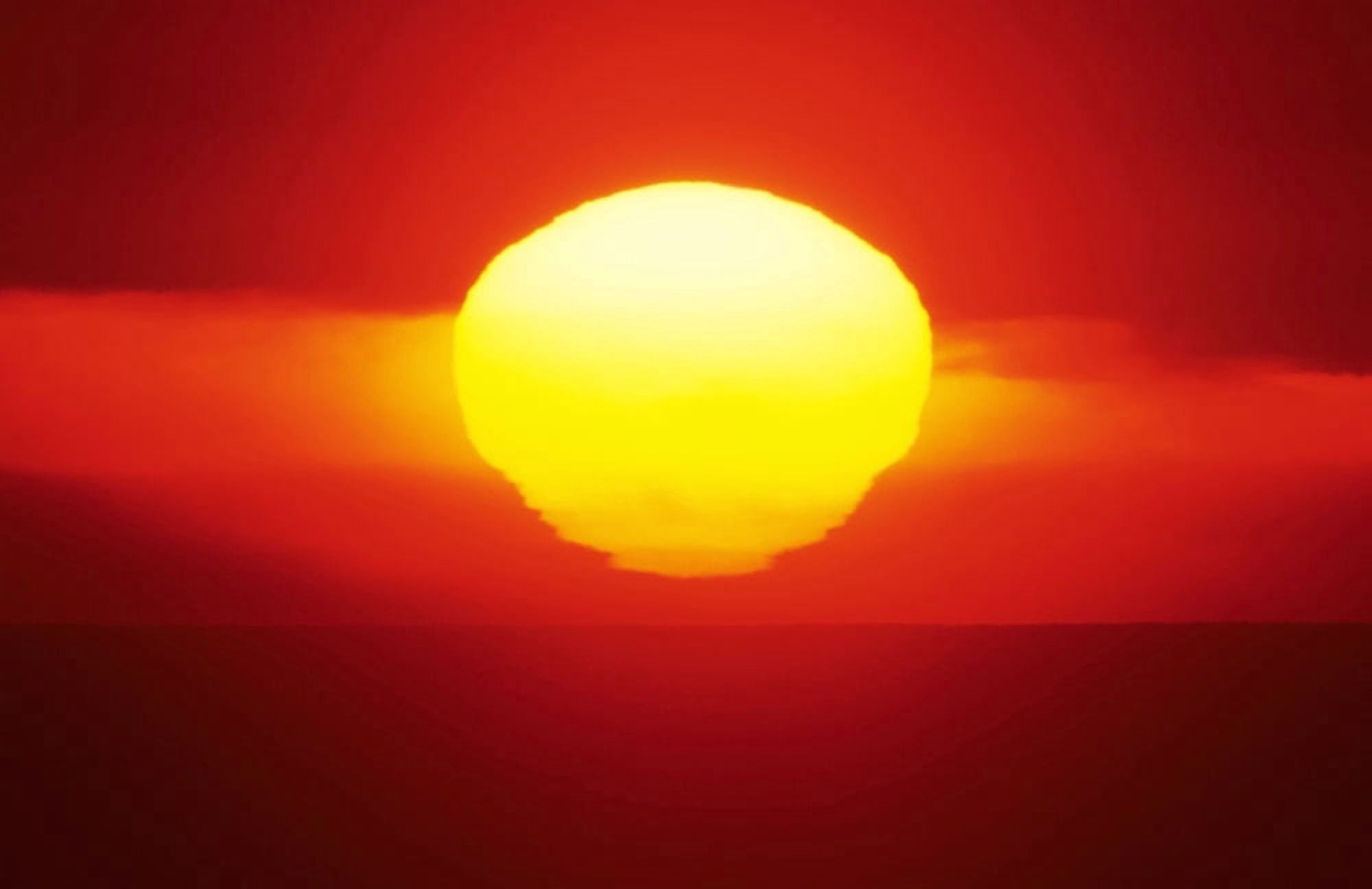 Gorgeous Sun Setting In Bright Orange Sky Over Ocean Canvas Art - Larry Dale Gordon Design Pics (34 x 22)