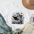 thumbnail image 1 of Gothic Reading Skeleton T-Shirt, Floral Halloween Tee for Spooky Bookworms, 1 of 5