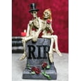 thumbnail image 1 of Gothic Skeleton Bridal Couple Sitting On Grave Tombstone With Red Roses Figurine, 1 of 9