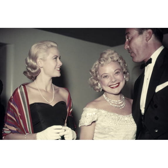 Grace Kelly candid 1950's in Hollywood with Cesar Romero at function 24x36 Poster