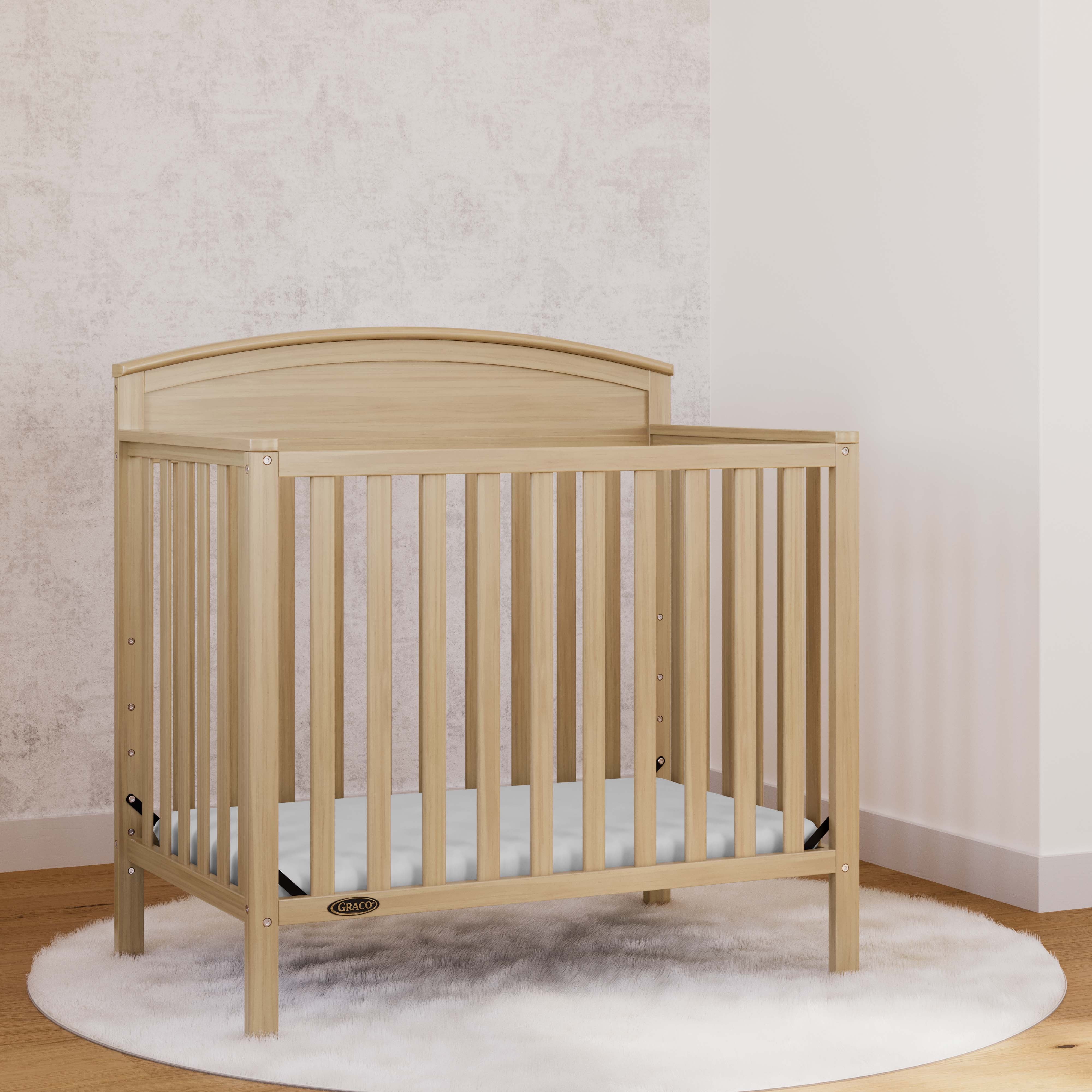 Graco Benton 4-In-1 Convertible Mini Baby Crib, Driftwood