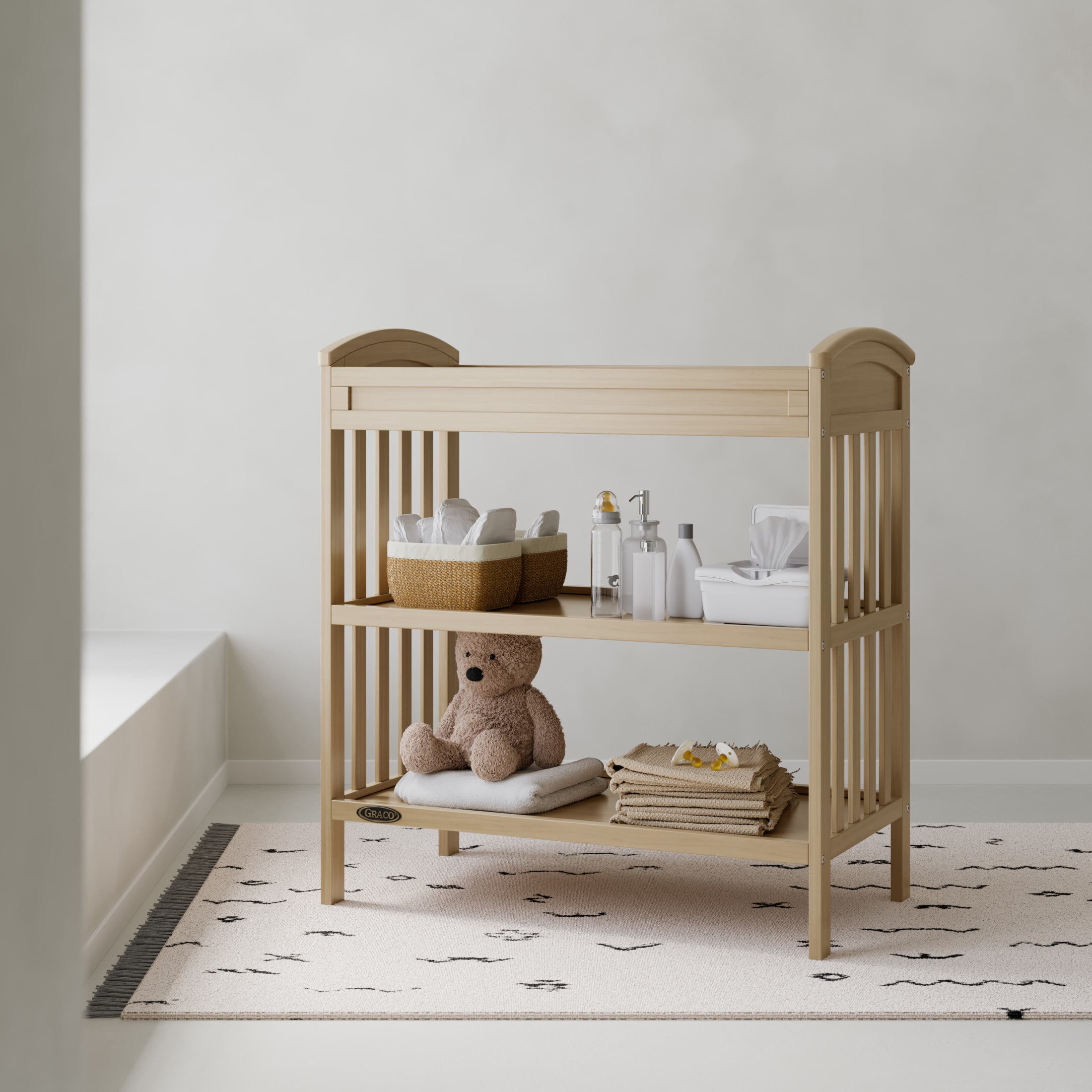 Graco Benton Infant Changing Table with Bonus Water-Resistant Changing Pad, Driftwood