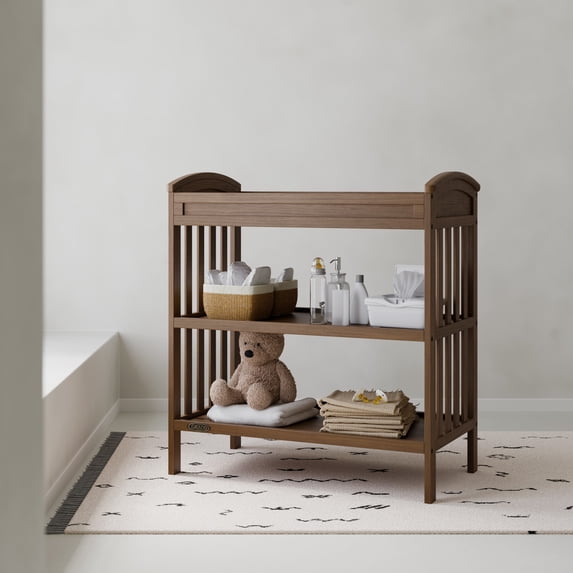 Graco Benton Infant Changing Table with Bonus Water-Resistant Changing Pad, Hazelnut
