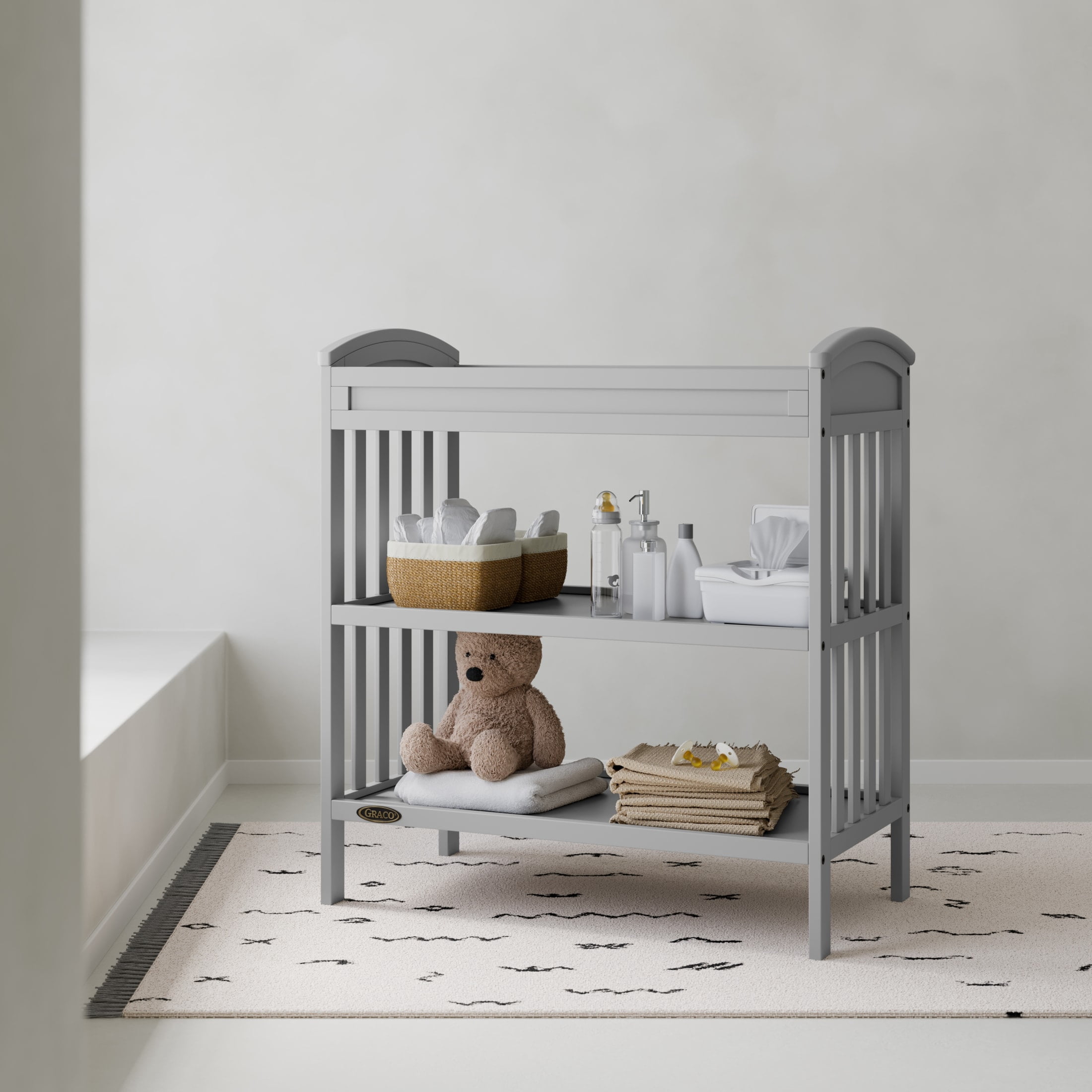 Graco Benton Infant Changing Table with Bonus Water-Resistant Changing Pad, Pebble Gray