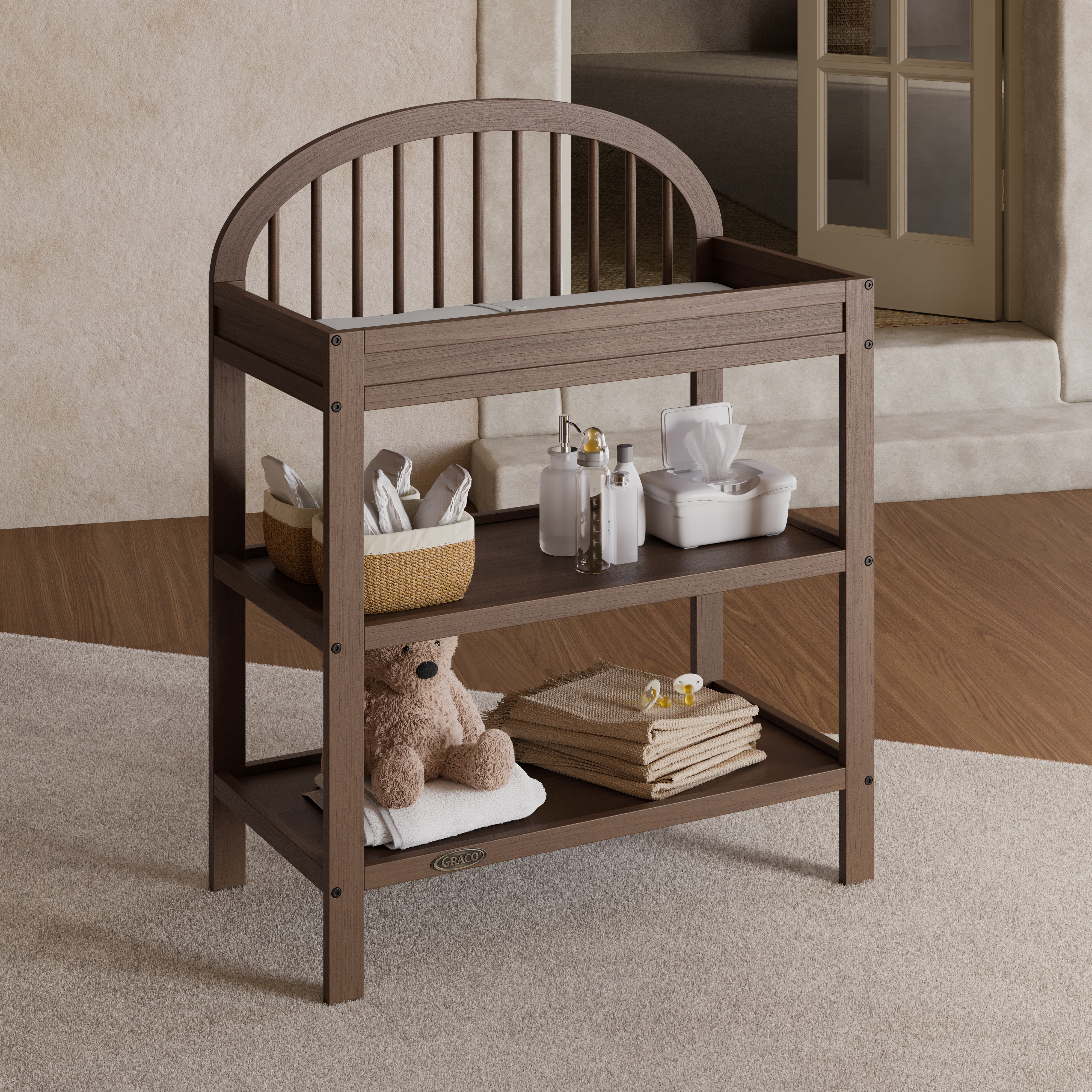 Graco Olivia Infant Wood Changing Table with Changing Pad, Hazelnut