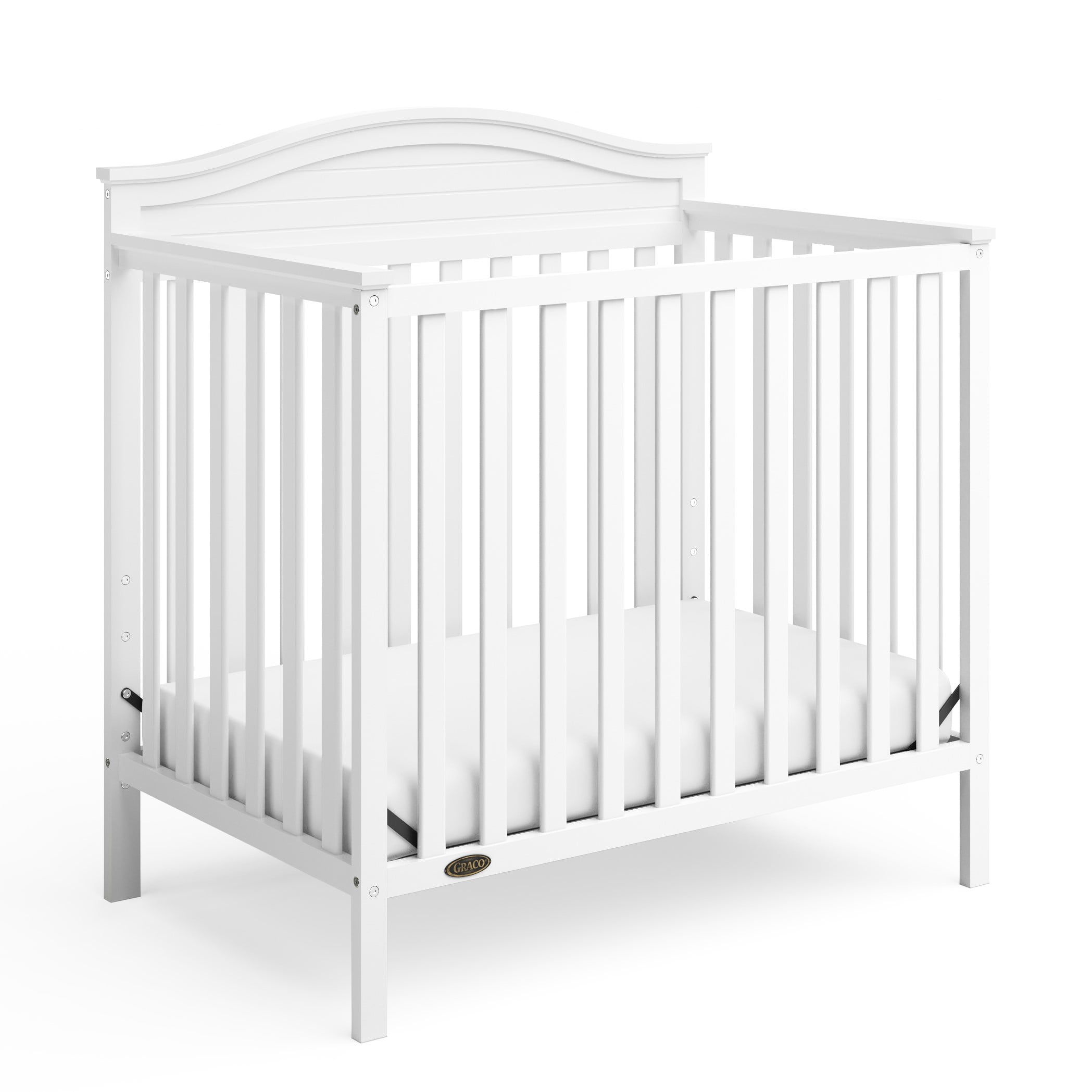 Stella White Pine Wood 4-in-1 Convertible Mini Crib with Foam Mattress