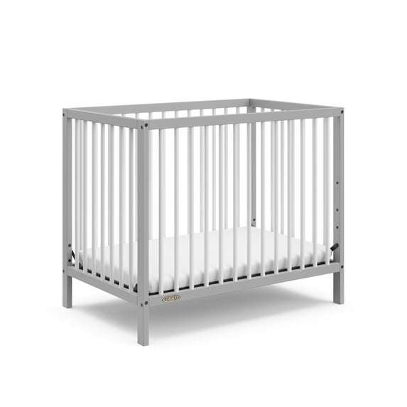 Graco Teddi 4-in-1 Convertible Mini Baby Crib with Mattress, Pebble Gray/White