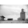 thumbnail image 1 of Grain Elevator 1939. Na Grain Elevator At A Railroad Station In Fairfield Montana. Photograph By Arthur Rothstein, 1 of 3
