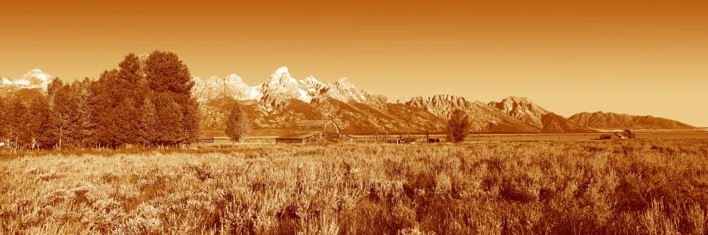This is Grand Teton National Park in sepiatone There is a pioneer farm with the Tetons behind it It is located off Highway 89 Canvas Art - Panoramic Images (36 x 12)