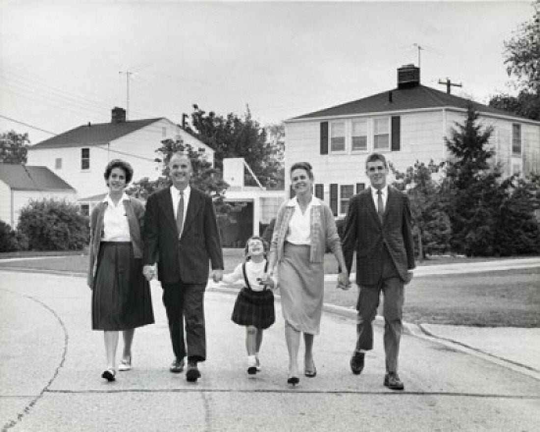 Granddaughter walking with parents and grandparents on suburban road Canvas Art - (18 x 24)