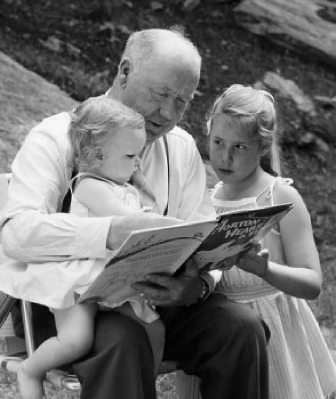 Grandfather reading a story to his two granddaughters Canvas Art -  (18 x 24)