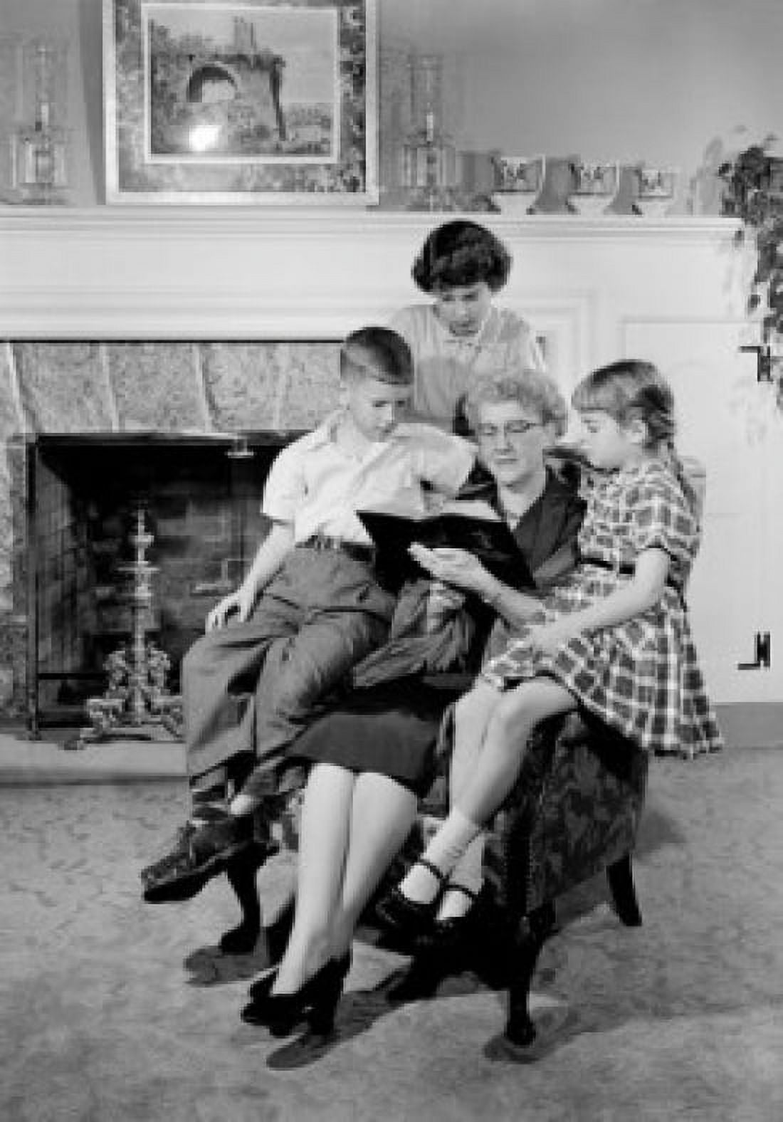 Grandmother with grandchildren reading in room Canvas Art - (24 x 36)