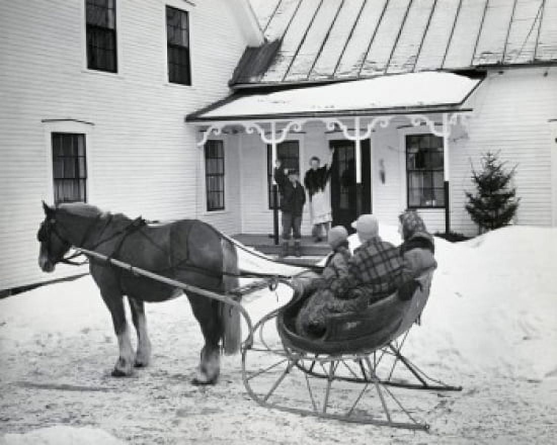 Grandparents waving at family sitting on sled Canvas Art - (18 x 24)
