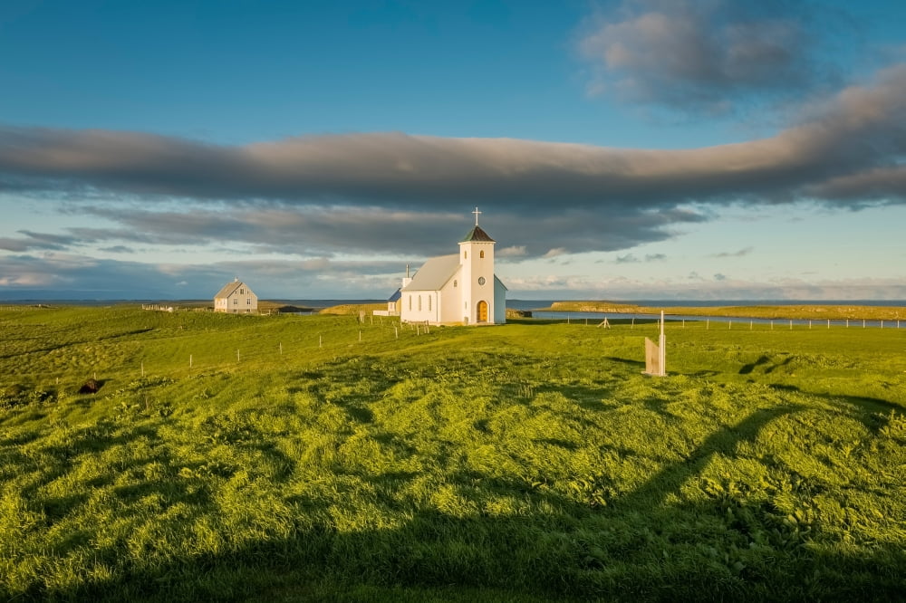 Grasslands and Flatey Church Flatey Island Borgarfjordur Iceland Canvas Art - Panoramic Images (36 x 12)