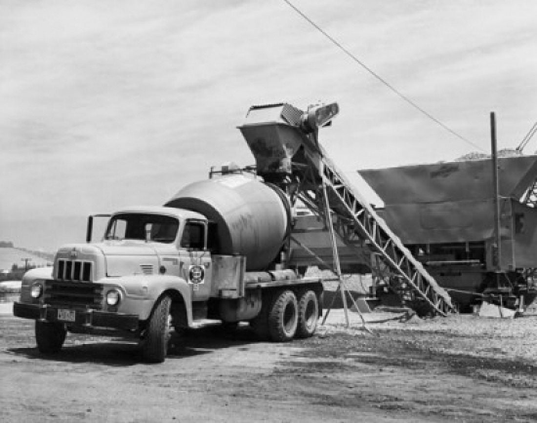 Gravel being poured in to a cement truck Canvas Art - (18 x 24)