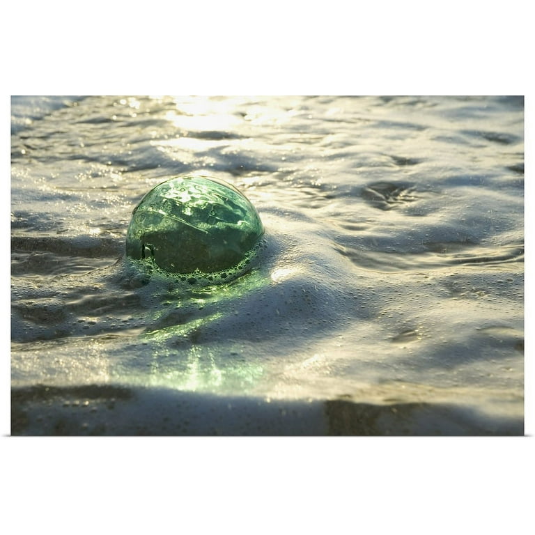 Great BIG Canvas  A Glass Fishing Ball Floats In Shallow Water Art Print  - 30x20 