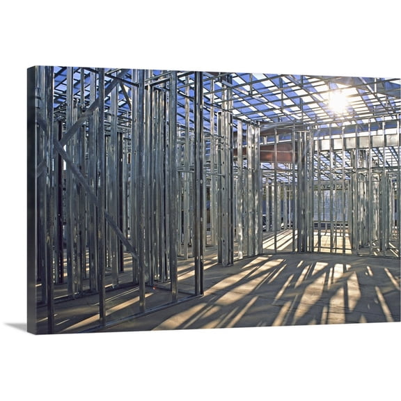 Great BIG Canvas | "New home steel framing at construction site" Canvas Wall Art - 48x32