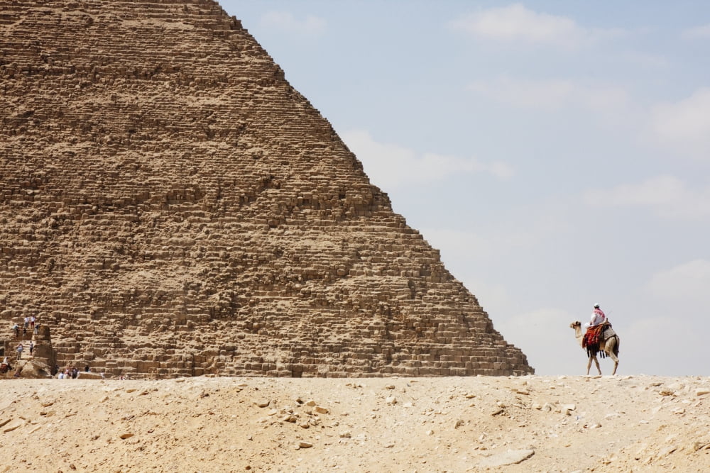 Great Pyramid Of Khufu (Cheops) And Camel Driver Giza Al Jizah Egypt Canvas Art - Peter Langer Design Pics (19 x 12)