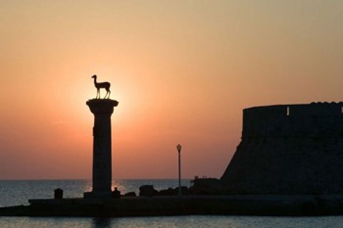 Greece Dodecanese Stag Columns Mandraki Harbor Canvas Art - Walter Bibikow DanitaDelimont (35 x 23)