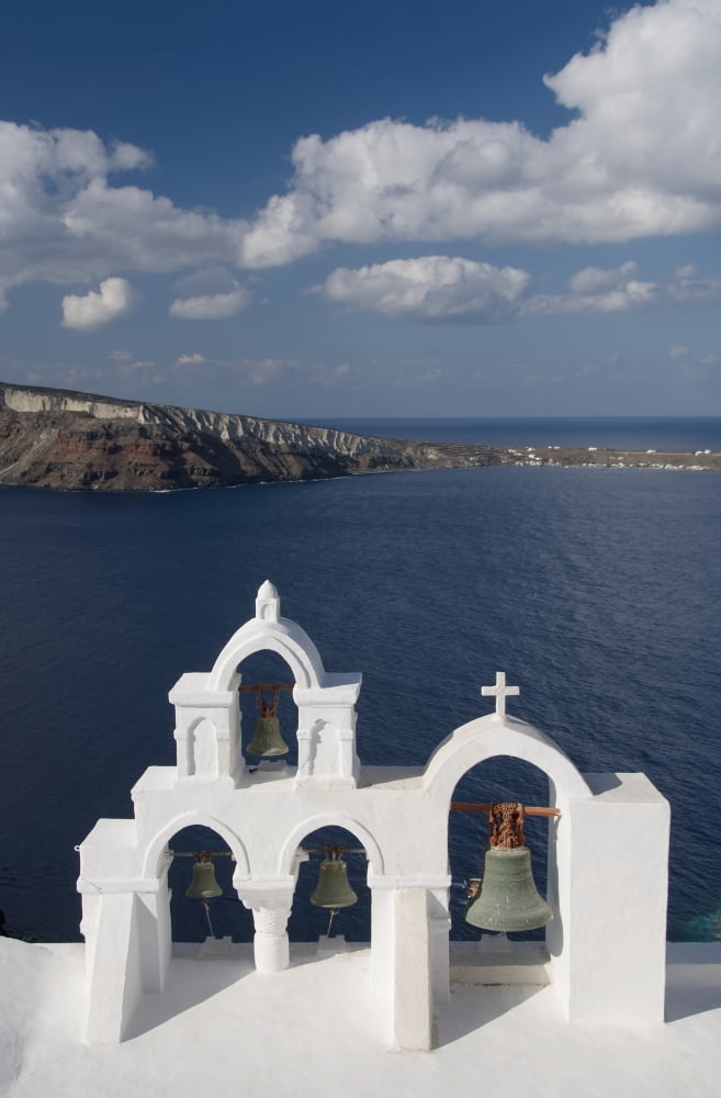 Greece Santorini Oia Architectural detail of Greek Orthodox Chrurch bell tower Mediterranean Sea and Island of Thirassia in the distance Canvas Art - Richard Maschmeyer Design Pics (24 x 38)
