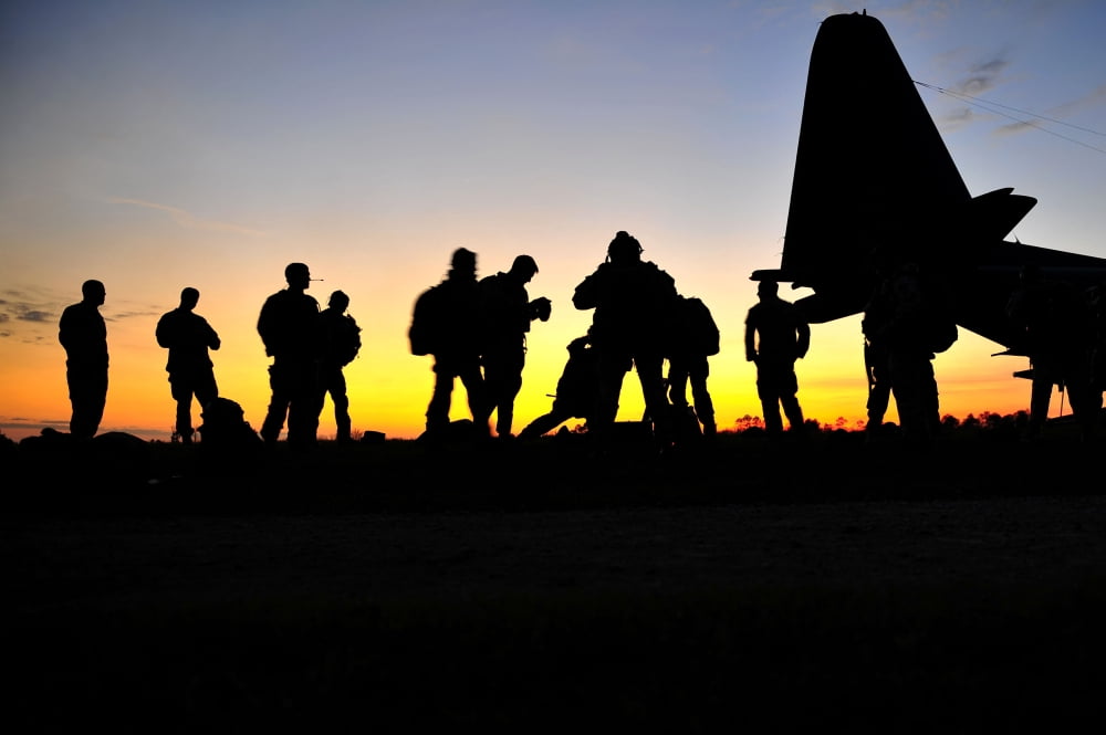 Green Berets prepare to board a KC-130 aircraft Canvas Art - Stocktrek Images (34 x 23)