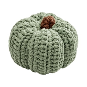 Green pumpkin decorations introduce a nature-inspired accent that balances fall tones while adding visual freshness to shelves, tables, and decorative arrangements.