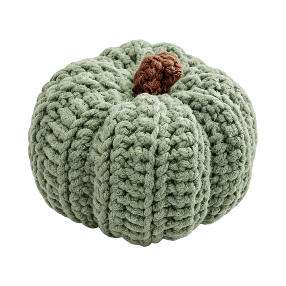 Green pumpkin decorations introduce a nature-inspired accent that balances fall tones while adding visual freshness to shelves, tables, and decorative arrangements.