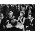 thumbnail image 1 of Greta Garbo Chatting with Friends on a Table Photo Print (24 x 30), 1 of 1