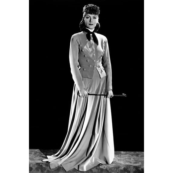 Greta Garbo in long dress holding riding crop 24x36 Poster