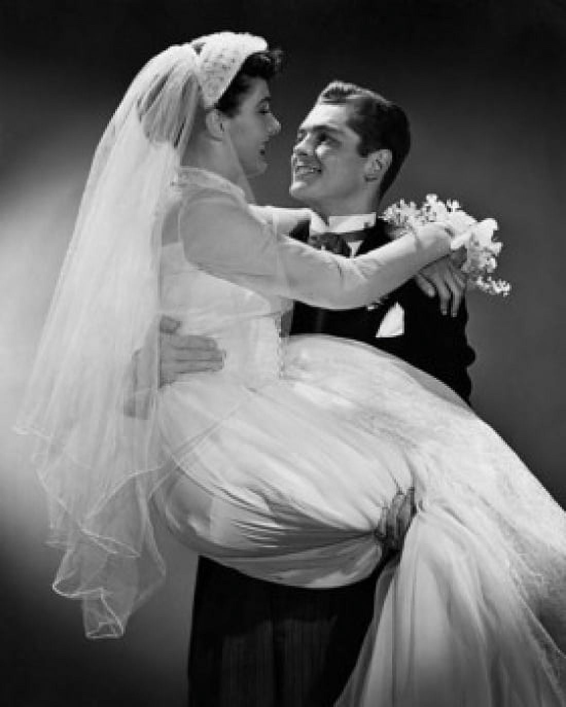 Groom carrying his bride and smiling Canvas Art - (18 x 24)