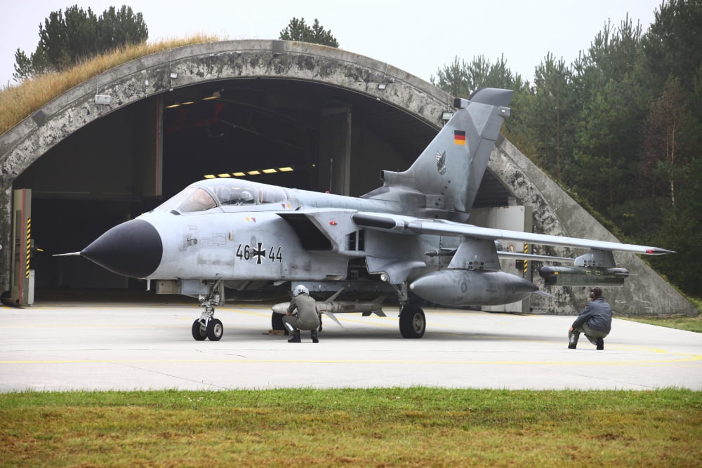 Ground crew conducting pre-flight-checks on a German Tornado ECR Canvas Art - Timm ZiegenthalerStocktrek Images (18 x 12)