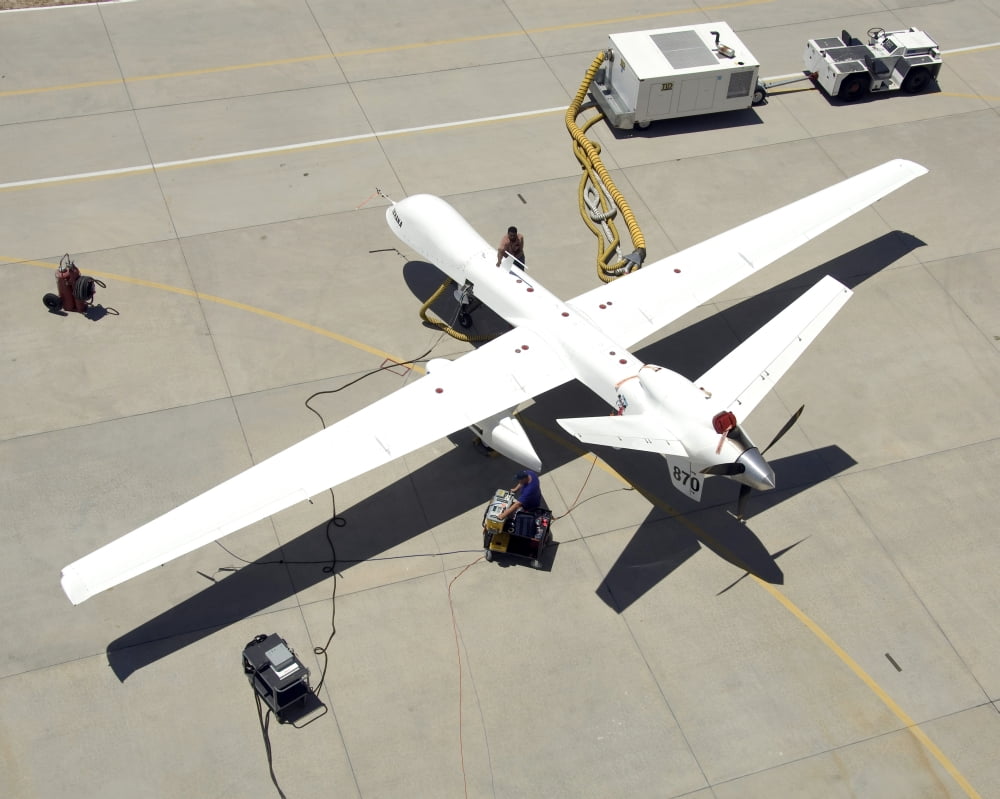 Ground crewmen prepare the Ikhana aircraft for another flight Canvas Art - Stocktrek Images (31 x 25)