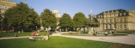 Group Of People Sitting Around A Fountain In A Park Schlossplatz Stuttgart Baden-Wurttemberg Germany Canvas Art - Panoramic Images (36 x 13)