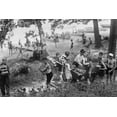 thumbnail image 1 of Group of Boys carry loaves of bread from wagons near beach front in woods. Poster Print (24 x 36), 1 of 1