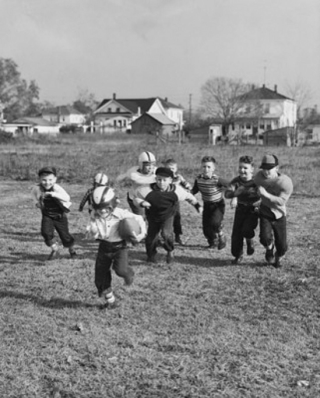 Group of boys playing football Canvas Art - (24 x 36)