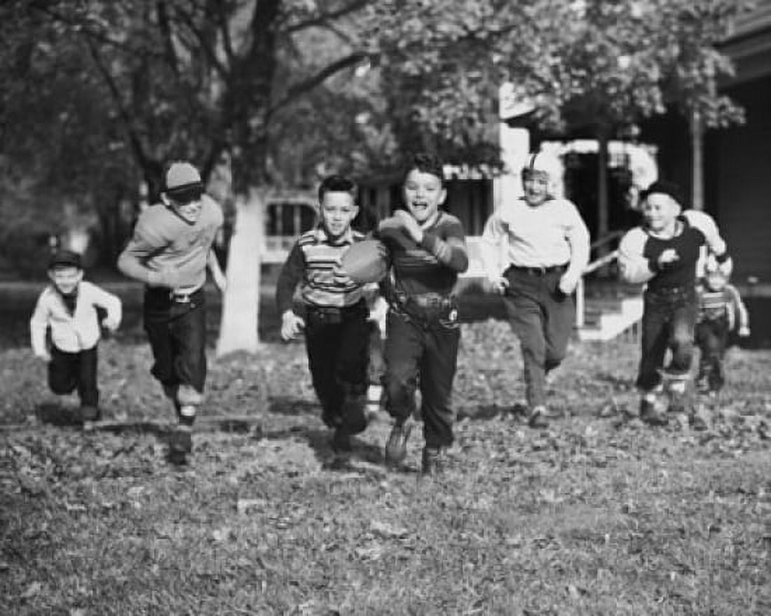 Group of boys playing football Canvas Art - (24 x 36)
